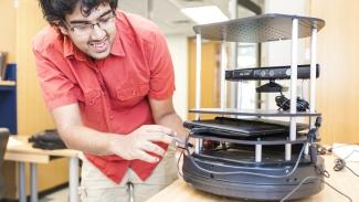 Student working on engineering project.