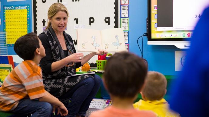 teacher reading to students