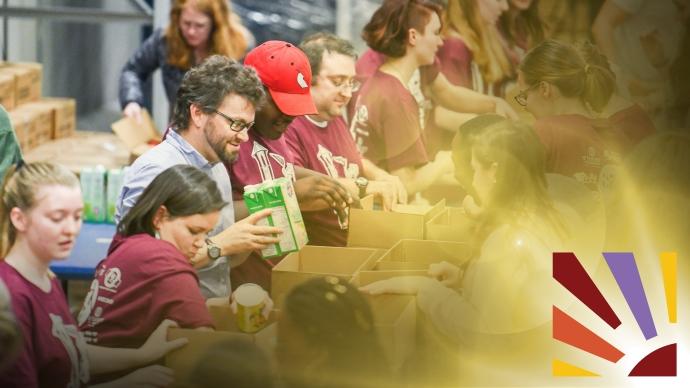 Volunteers sort food at San Antonio Food Bank Warehouse